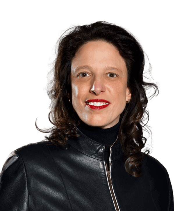 Head-and-shoulders portrait of a smiling woman with dark hair wearing a black leather jacket.